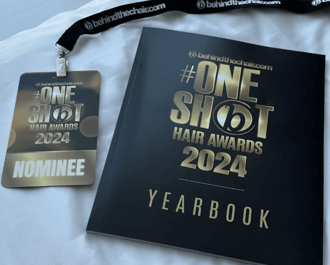 #ONESHOT Yearbook with nominee badge and lanyard