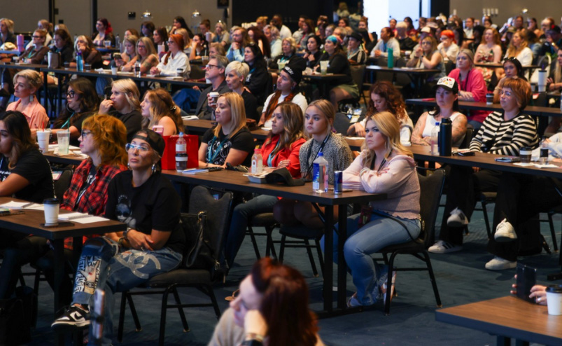 Hairstylists packed at tables during the Tuesday Business Workshop at The BTC Show